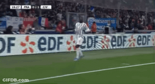 Soccer Player Running In Front Of EDF Sign GIF