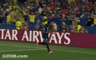 Soccer Player Running In Front Of Lenovo Ad GIF