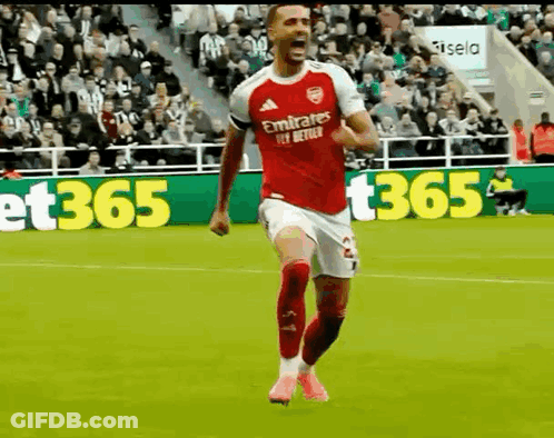 Soccer Player Running In Red Emirates Fly Better Jersey GIF