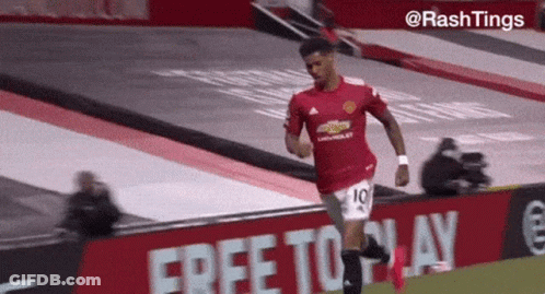 Soccer Player Running In Red Jersey Number 10 GIF