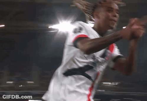 Soccer Player Running In White Qatar Shirt GIF