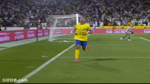 Soccer Player Running On Field With Emirates Ads GIF