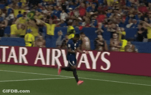 Soccer Player Running On Field With Lenovo Banner GIF