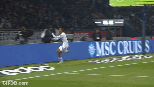 Soccer Player Running On Field With MSC Cruises Sign GIF