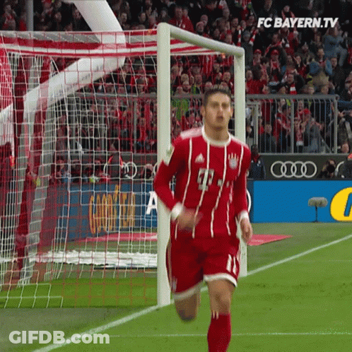 Soccer Player Running Towards Goal FC Bayern.tv Logo GIF