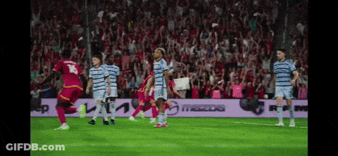 Soccer Player Running With Cameraman GIF