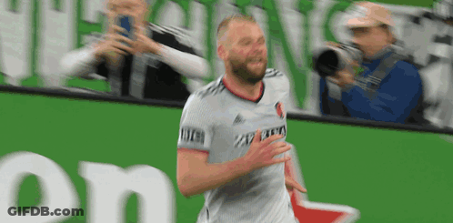 Soccer Player Running With Cameraman GIF