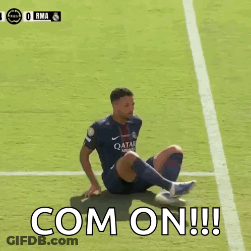 Soccer Player Sits On Field With Com On GIF
