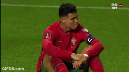 Soccer Player Sitting Head Down Hands On Knees GIF