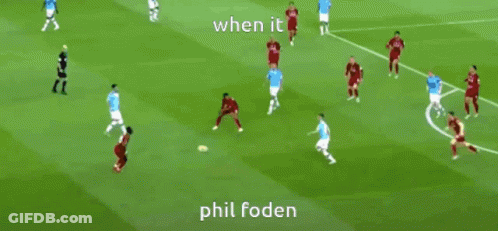Soccer Player Sitting On Grass With Legs Crossed GIF