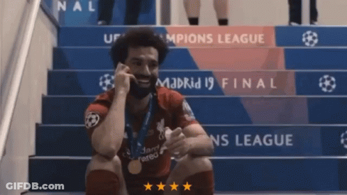Soccer Player Sitting On Madrid Stairs GIF