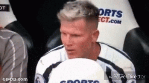 Soccer Player Sitting With Ball GIF