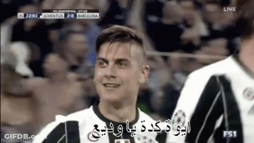 Soccer Player Smiling In Black And White Jersey GIF