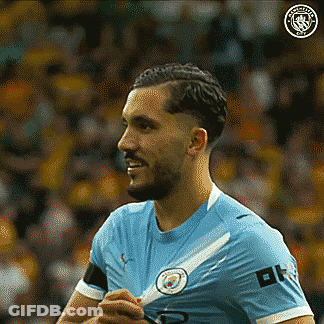 Soccer Player Smiling In Blue City Logo Shirt GIF
