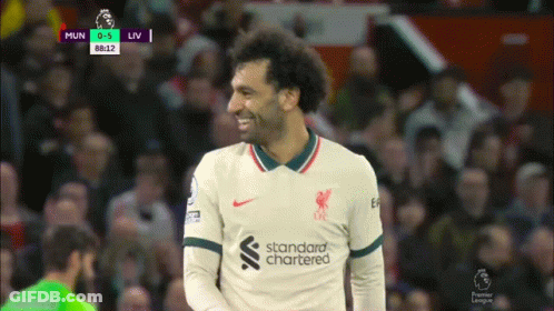Soccer Player Smiling In Standard Chartered Jersey GIF