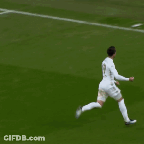 Soccer Player Standing In Front Of 32R Sign GIF