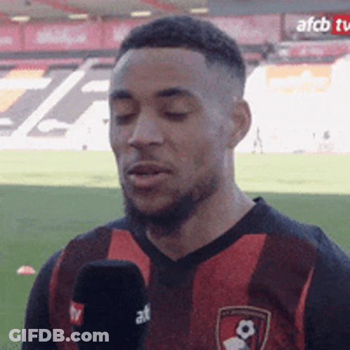 Soccer Player Talking Into Microphone GIF