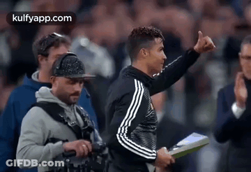 Soccer Player Thumbs Up Holding Clipboard GIF
