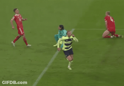Soccer Player Thumbs Up In Neon Yellow And Blue Jersey GIF