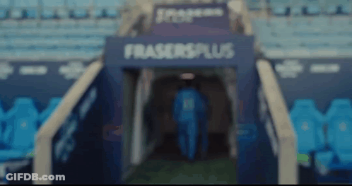Soccer Player Walking Through Fraser's Plus Tunnel GIF