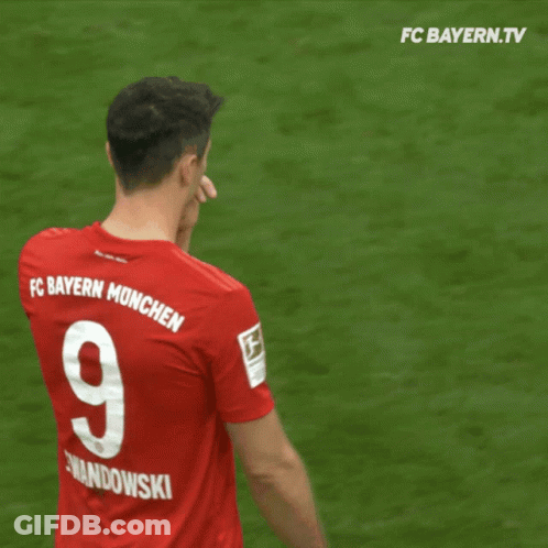 Soccer Player Wearing A Red Jersey With The Number 9 On It GIF