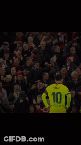Soccer Player Wearing A Yellow Jersey With The Number 10 On The Back GIF