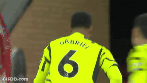 Soccer Player Wearing A Yellow Jersey With The Number 6 On The Back GIF