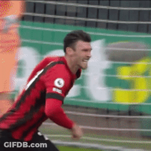 Soccer Player Wearing Red And Black Jersey Number 9 GIF