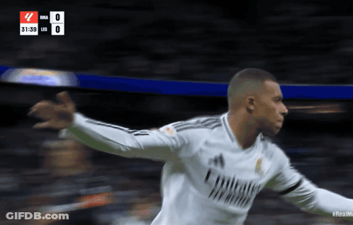 Soccer Player With Arms Outstretched On Field GIF