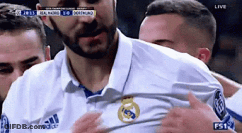 Soccer Player With Beard Hugged By Teammates GIF