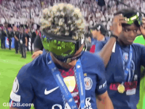 Soccer Player With Goggles And Qatar Medal GIF