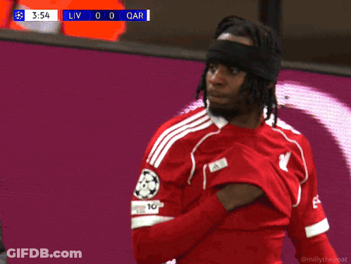 Soccer Player With Headband In Front Of Scoreboard Saying 3:54 GIF