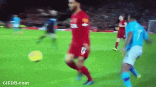 Soccer Player With Man In Liverpool Jacket GIF