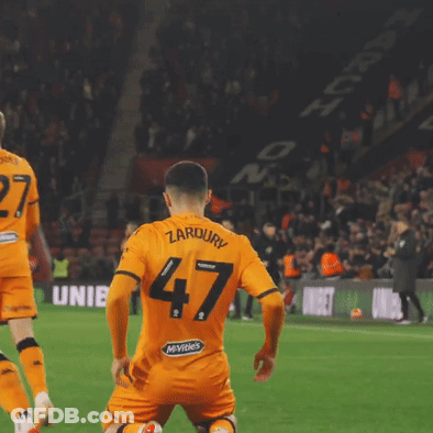 Soccer Player With Number 47 Kneeling On Field GIF