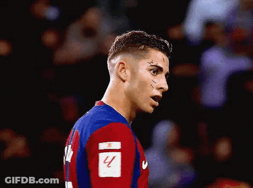 Soccer Player With Scar And Number 4 Jersey GIF