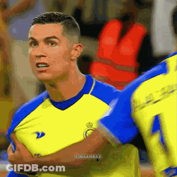 Soccer Player With Yellow Blue Jersey Number 22 GIF