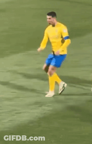 Soccer Player Yellow Shirt Blue Shorts Dancing GIF