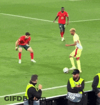 Soccer Players And Man In Number 49 Vest GIF
