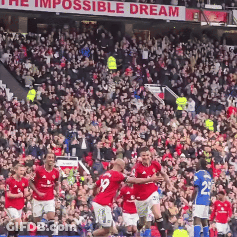 Soccer Players Celebrating Goal GIF