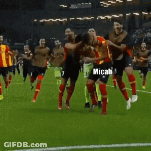 Soccer Players Celebrating Goal GIF