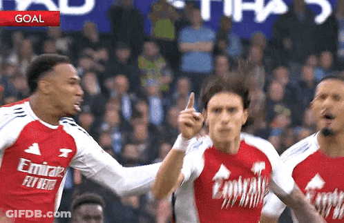Soccer Players Celebrating Goal In Emirates Jerseys GIF