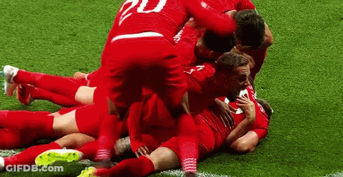 Soccer Players Celebrating Goal GIF