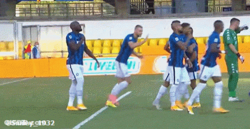 Soccer Players Celebrating Goal With Smiley 1932 Ad GIF