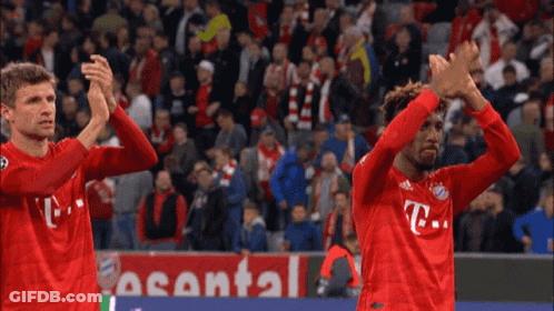 Soccer Players Clapping In Front Of T-Mobile Sign GIF