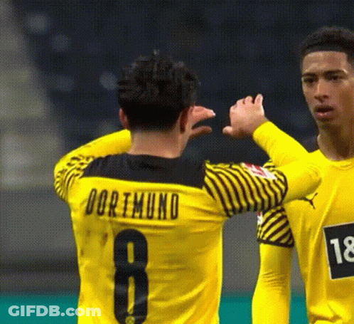 Soccer Players High Five During Game GIF