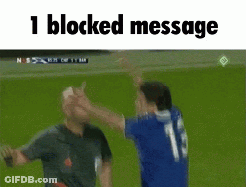 Soccer Players High Five With 1 Blocked Message GIF