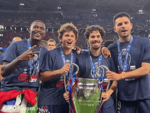 Soccer Players Holding Champions Trophy GIF