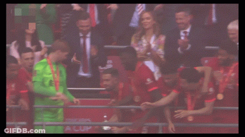 Soccer Players Holding Emirates Trophy GIF