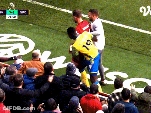 Soccer Players Holding Emirates Trophy GIF