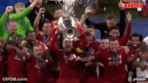 Soccer Players Holding Trophy Celebrating GIF